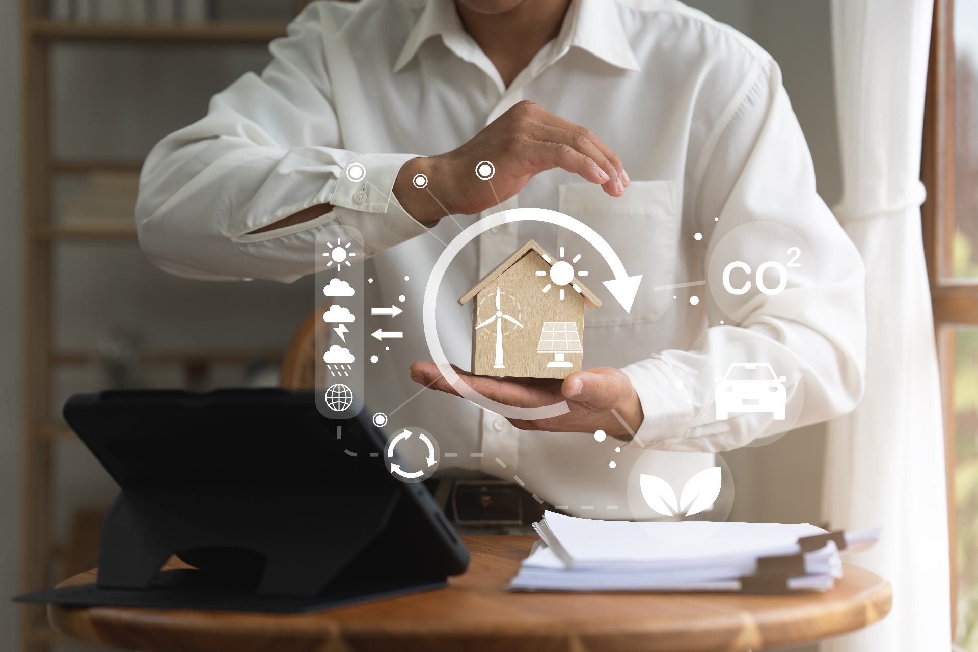 A property manager reviewing arrears and tenancy deadlines while an AI assistant drafts the routine tenant correspondence