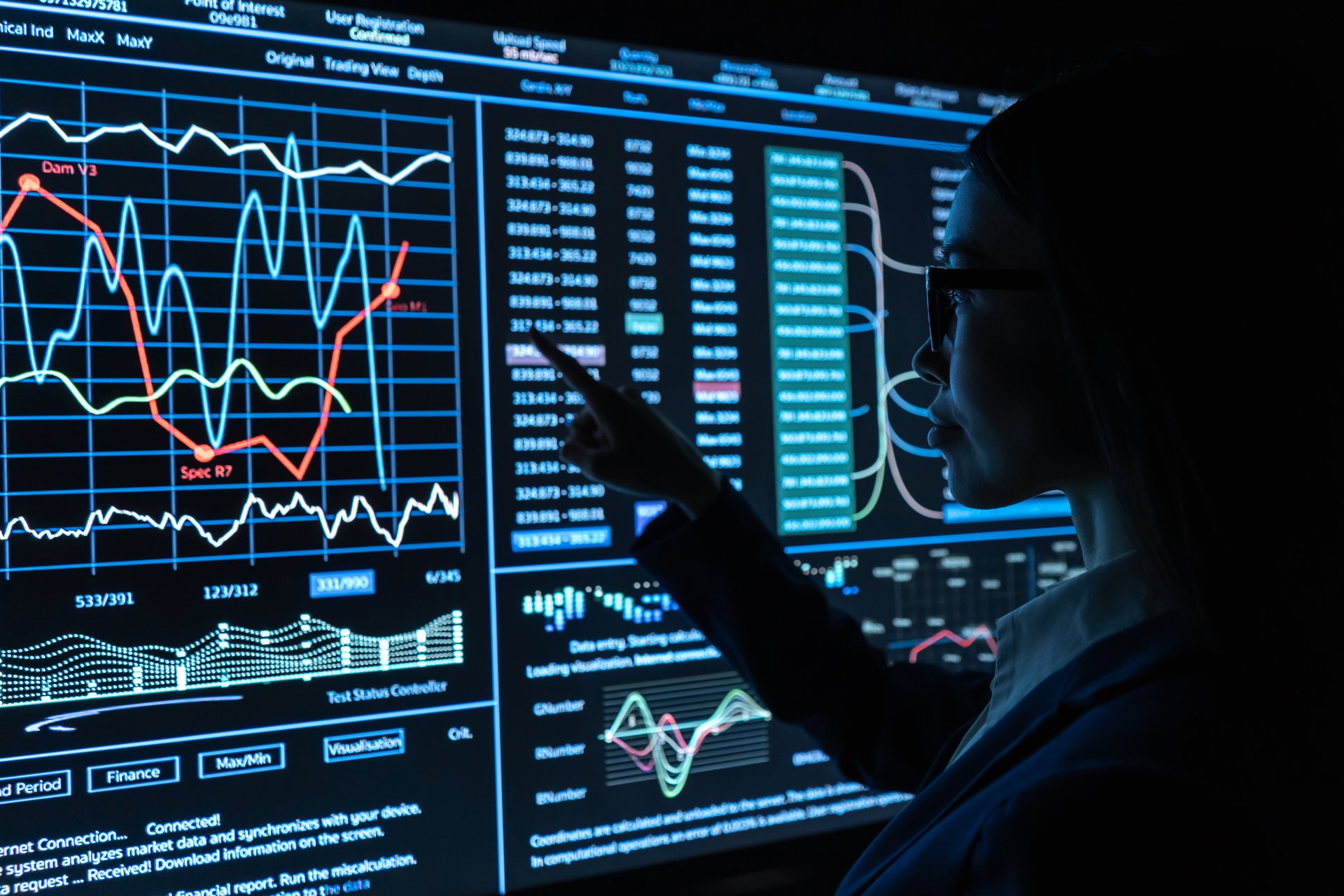 A logistics analyst reviewing freight demand data on a screen, the planning view Snowflake and Power BI put in front of the carrier each week