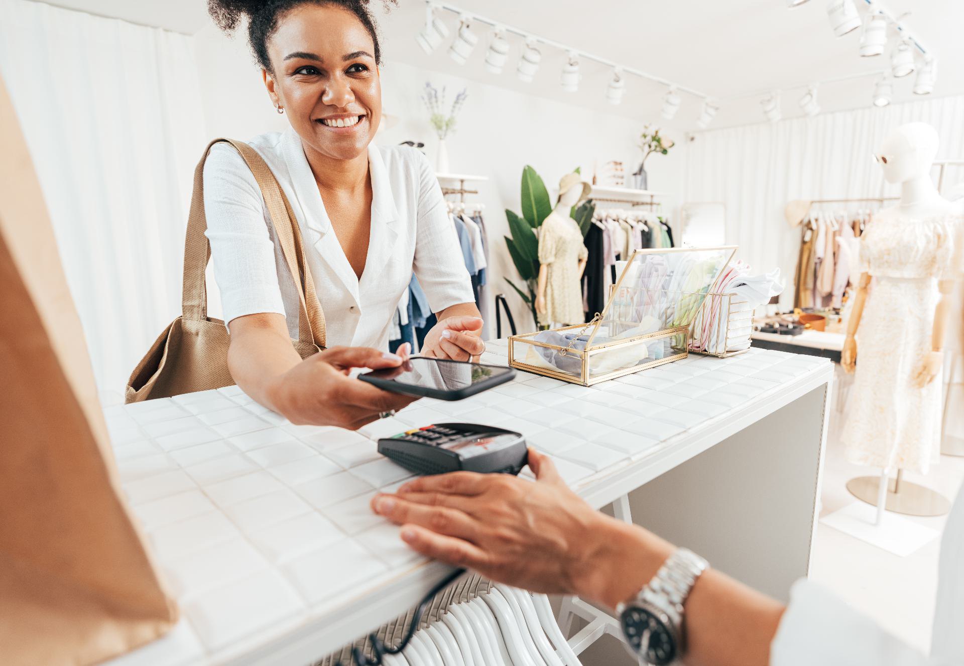 An IT lead reviewing SharePoint sharing settings on a Microsoft 365 admin screen before a Copilot rollout
